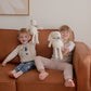 Image of exclusive Petite Maison Play & Purebaby organic personalised knitted bunny toy