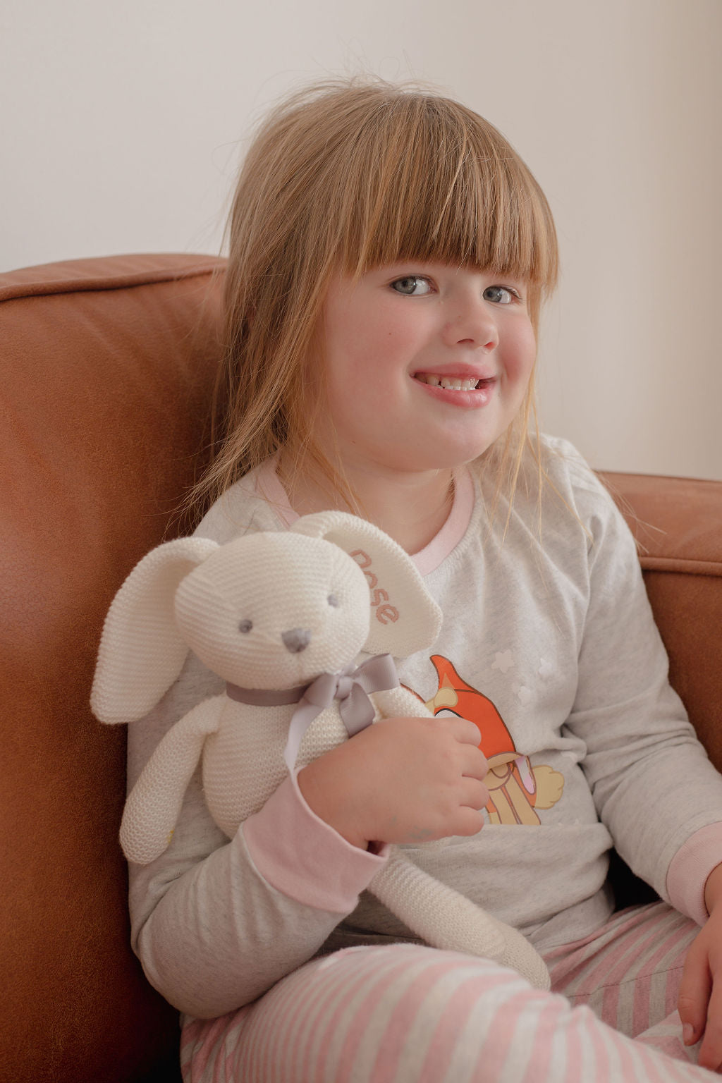 Image of exclusive Petite Maison Play & Purebaby organic personalised knitted bunny toy